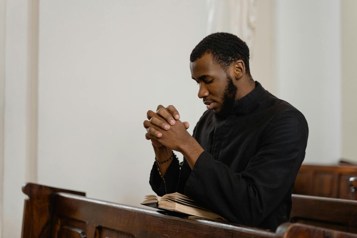 black man praying