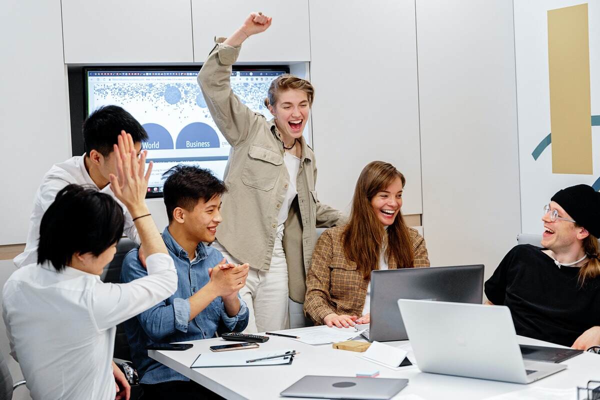 Team during a group coaching session - Group Coaching Tools