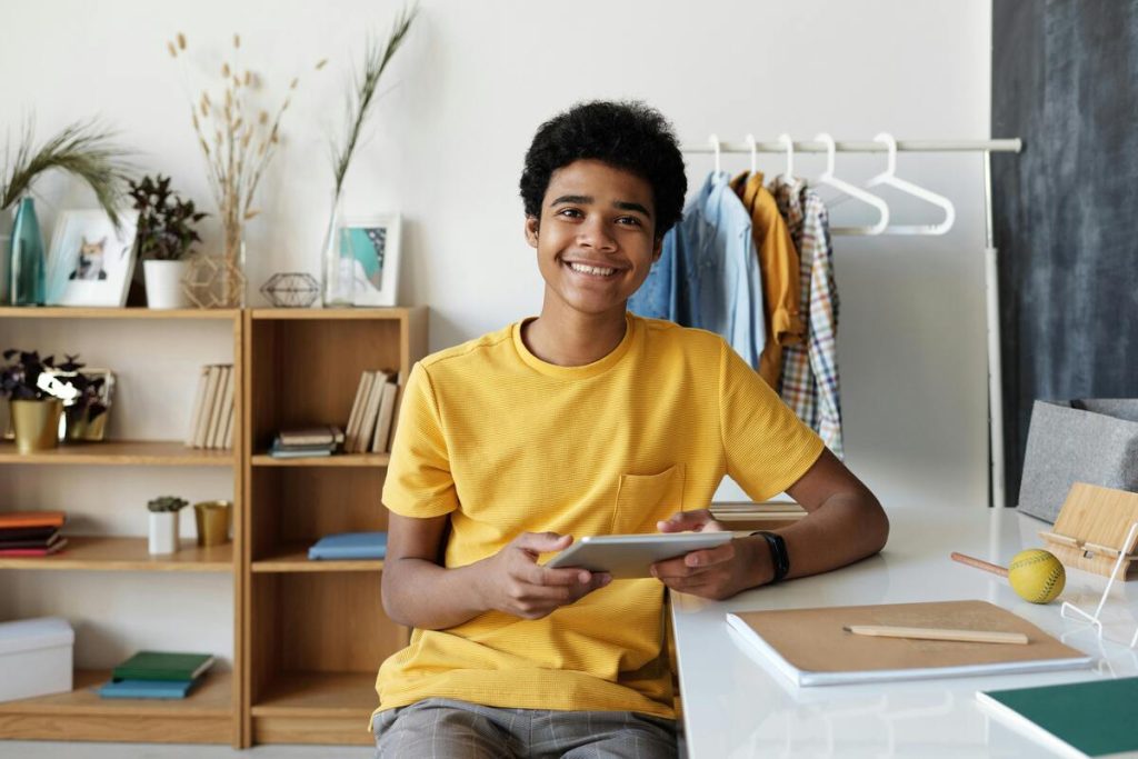 Teen smiling during teen life coaching session