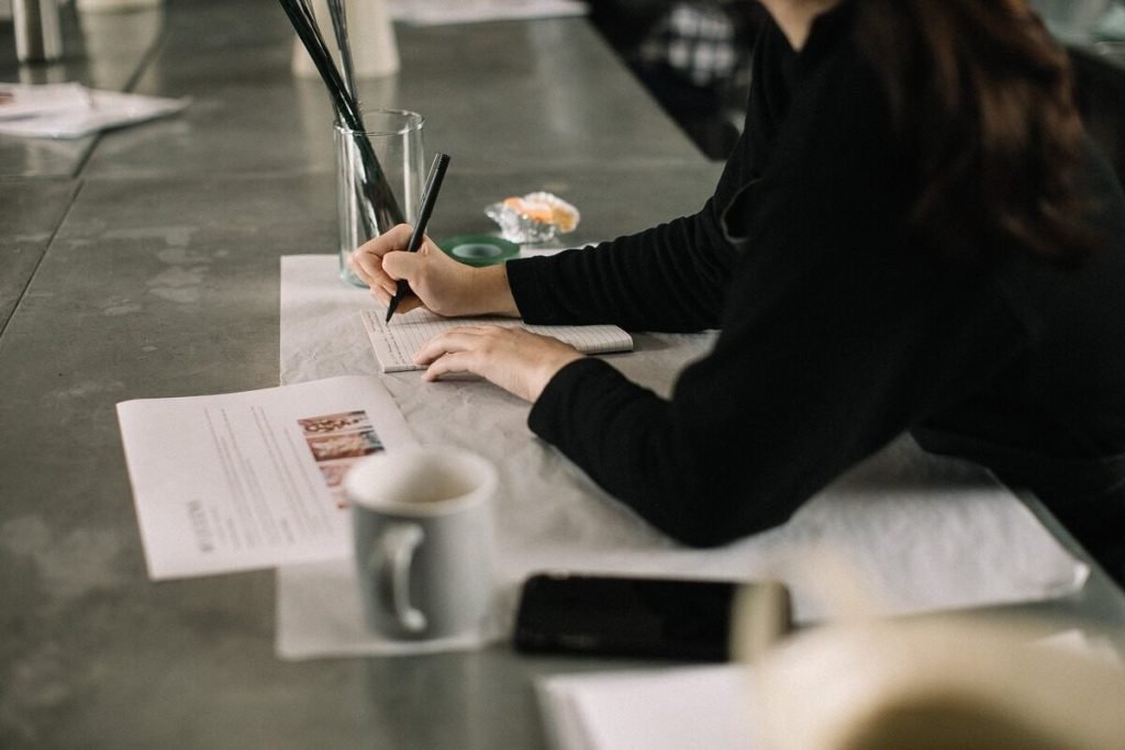 Woman taking notes